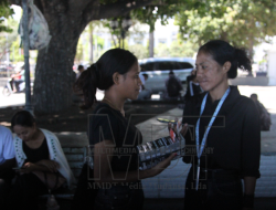 To Reduce The Burden On Parents, Natalia Sells Cigarettes On The Side Of The Road To Support Her Studies.